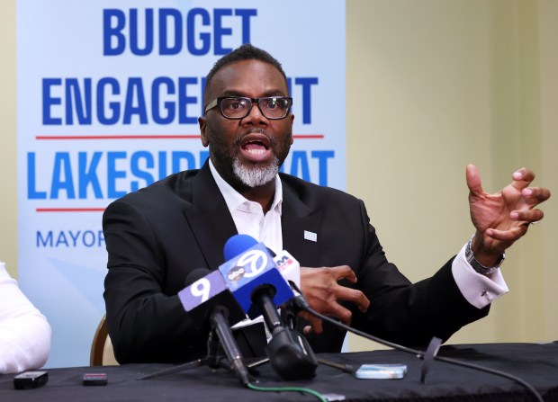 Mayor Brandon Johnson speak to the media about the city's budget before the start of a community event at the Harold Washington Library Center in Chicago on Feb. 4, 2025. (Terrence Antonio James/Chicago Tribune)