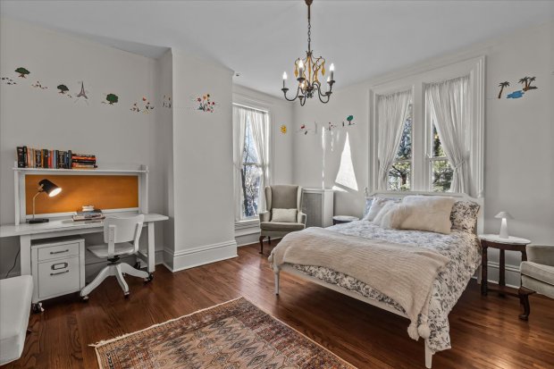 This four-bedroom home at 1326 Asbury Ave., Evanston, has a three-car heated garage as well as a darkroom in the basement. (Philip Goldman/Summit Imaging)