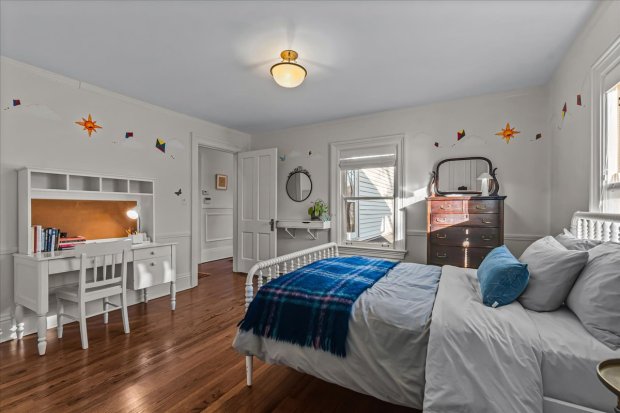 This four-bedroom home at 1326 Asbury Ave., Evanston, has a three-car heated garage as well as a darkroom in the basement. (Philip Goldman/Summit Imaging)