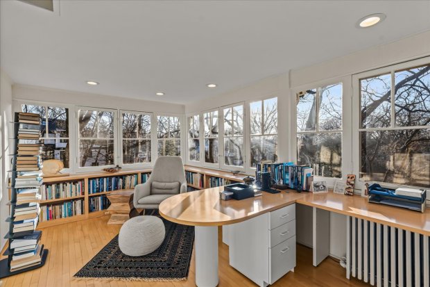 This four-bedroom home at 1326 Asbury Ave., Evanston, has a three-car heated garage as well as a darkroom in the basement. (Philip Goldman/Summit Imaging)