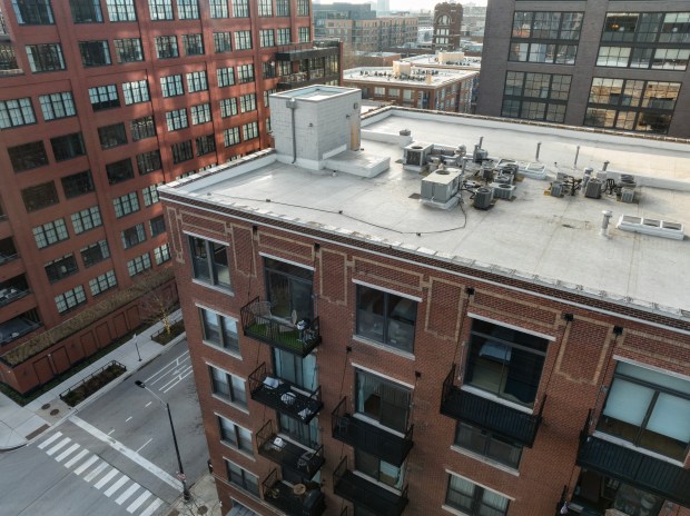 This two-bedroom, two-bathroom penthouse condo at 106 N. Aberdeen St., Unit PH2, comes with the rights to build a rooftop space. (Steven Caban/Full Bars Media)