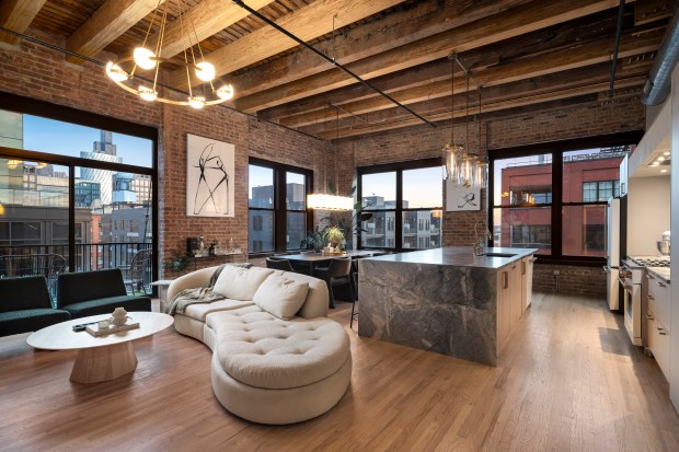 This two-bedroom, two-bathroom penthouse condo at 106 N. Aberdeen St., Unit PH2, comes with the rights to build a rooftop space. (Steven Caban/Full Bars Media)