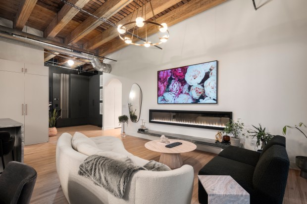 This two-bedroom, two-bathroom penthouse condo at 106 N. Aberdeen St., Unit PH2, comes with the rights to build a rooftop space. (Steven Caban/Full Bars Media)