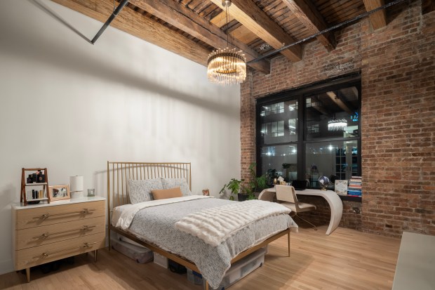 This two-bedroom, two-bathroom penthouse condo at 106 N. Aberdeen St., Unit PH2, comes with the rights to build a rooftop space. (Steven Caban/Full Bars Media)