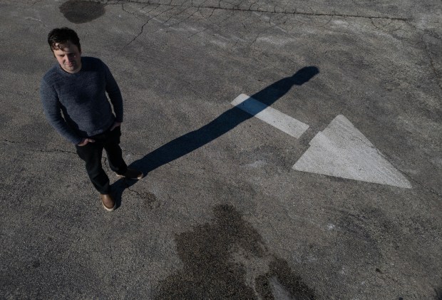 Shane Selig stands near his home on Feb. 21, 2025, in Highland Park. He was at the Highland Park mass shooting and rendered aid to victims. (Stacey Wescott/Chicago Tribune)