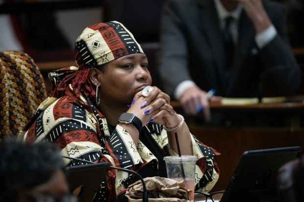 Ald. Jeannette Taylor, 20th, waits her turn to speak during debate over funding for migrant aid in the city council chambers on May 31, 2023. (E. Jason Wambsgans/Chicago Tribune)