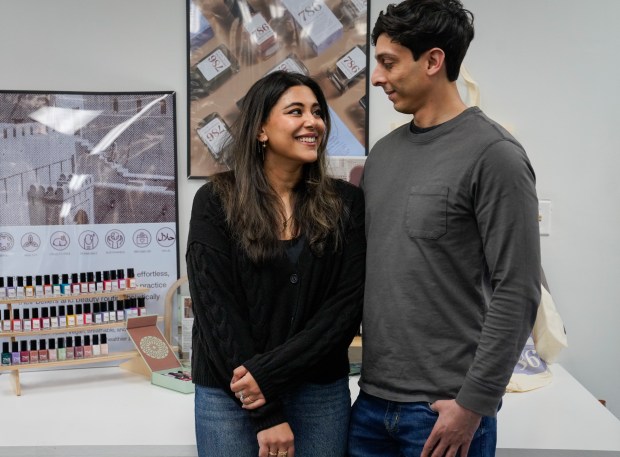 Owners of 786 Cosmetics Iqra Isphahani, left, and her husband, Ibrahim Ali, at Invent Inc. headquarters in Schaumburg on Feb. 6, 2025. Invent Inc. is the parent company for 786 Cosmetics. (Audrey Richardson/Chicago Tribune)