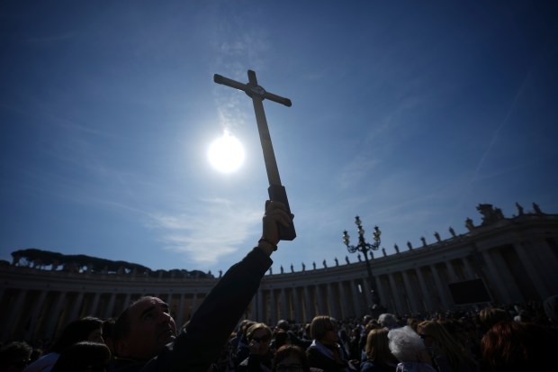 Faithful participating in the Jubilee arrive in St. Peter's Square at The Vatican, Sunday, Feb. 23, 2025, where they were supposed to say the Sunday's Angelus prayer with Pope Francis who was admitted over a week ago at Rome's Agostino Gemelli Polyclinic and is in critical condition. (Alessandra Tarantino/AP)