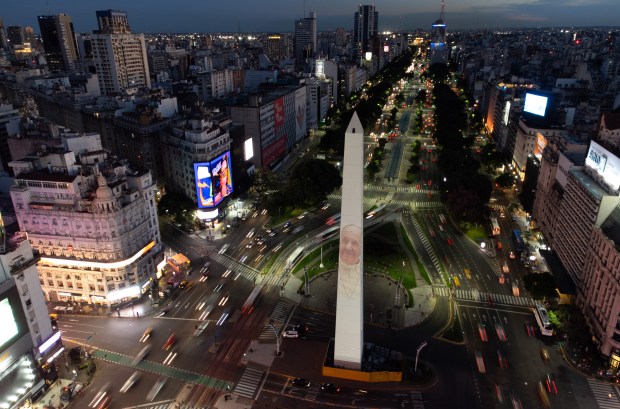 Aerial view of the Buenos Aires Obelisk illuminated with a projection of Pope Francis portrait as he recovers of a respiratory tract infection on Feb. 22, 2025, in Buenos Aires, Argentina. Pope Francis was hospitalized in Rome on Friday 14th with bronchitis, and was subsequently treated for a respiratory tract infection. On Monday, the Vatican confirmed the 88-year-old pontiff will remain in hospital as the "complex clinical picture" around his health is addressed. (Tobias Skarlovnik/Getty)