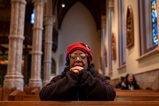 Rose Williams prays before Mass on Feb. 23, 2025, at Holy Name Cathedral in River North as Catholics around the world monitored the health of Pope Francis. (Brian Cassella/Chicago Tribune)