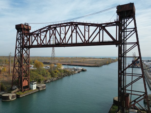 Bridge #710 frames an empty parcel of land, what remains of the former U.S. Steel South Works site on Oct. 22, 2024. The parcel of land is surrounded by water on three sides including Lake Michigan to the east and the Calumet River to the south. PsiQuantum has plans to anchor the new Illinois Quantum & Microelectronics Park, a 128-acre quantum campus on the border between Illinois and Indiana. (Stacey Wescott/Chicago Tribune)