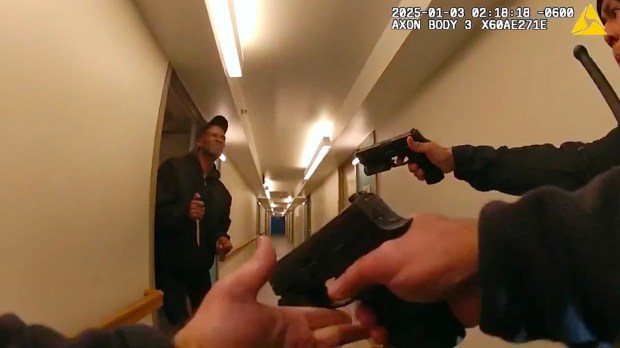 An image from video released by the Civilian Office of Police Accountability shows the fatal shooting of Timothy Glaze by Chicago police officers in a Little Village apartment hallway on Jan. 3, 2025. (COPA)