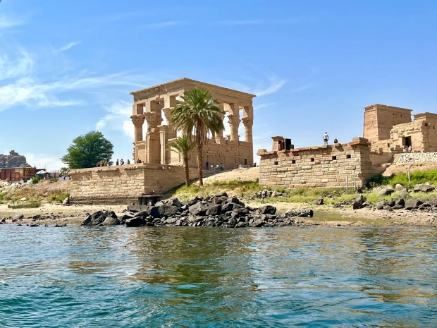 The Temple of Isis at Philae, on the island of Agrikia, Egypt is a frequent stop for Nile cruise boats, although passengers must transfer to a small boat to visit the picturesque temple. (Marla Jo Fisher/Orange County Register)