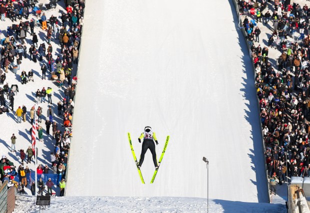 Sandra Sproch, 17, flies off the 70 meter ski jump at the 120th Norge Annual Winter Ski Jump Tournament at the Norge Ski Club in Fox River Grove on Jan. 25, 2025. Sproch will make her debut at the World Championship in Trondheim, Norway at the end of February. (Stacey Wescott/Chicago Tribune)