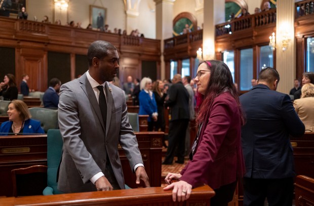 State Rep. LaShawn Ford, left, shown at the Capitol in 2023 with state Rep. Kelly Cassidy, has sponsored a bill that would explicitly prevent school police from ticketing and fining students for misbehavior.(Brian Cassella/Chicago Tribune)