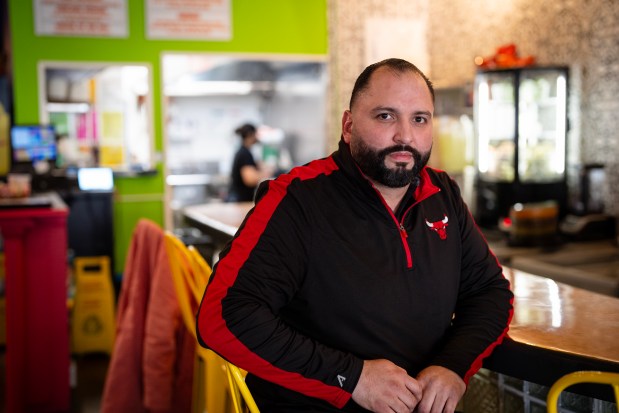 Cesar Gonzalez, owner of L'Patron in Chicago's Bucktown neighborhood is anxious as many in his community face the threat of ICE raids. (E. Jason Wambsgans/Chicago Tribune)