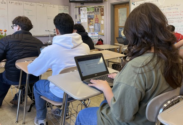 A Waukegan High School/College of Lake County dual-credit class writes essays. (Photo courtesy of Waukegan Community Unit School District 60)