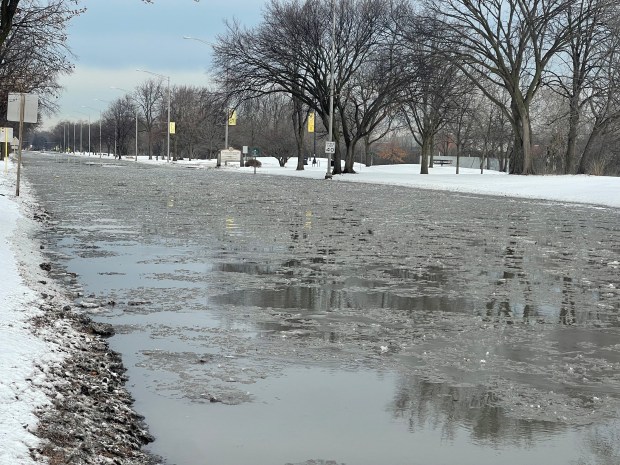 A water main break flooded areas of Skokie Friday morning, causing Skokie and Evanston to instruct residents to boil water used for drinking. It also closed roads, sent schools to e-learning and flooded garages, turning to ice. (Richard Requena, Pioneer Press)