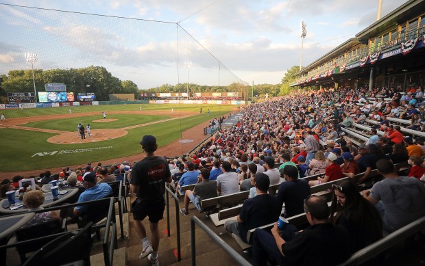 A Fourth of July weekend crowd fills the stands at Northwestern Medicine Field in Geneva during a game between the Kane County Cougars and the Lake County DockHounds on July 2, 2022. The team, which was recently sold to REV Entertainment, will keep playing in Geneva, officials said. (H. Rick Bamman / For The Beacon-News)