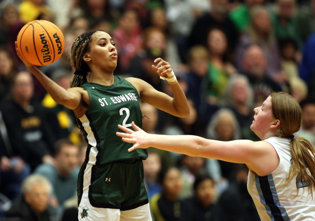 St. Edward's Savannah Lynch (2)throws a pass across the court past Willows Academy's Maura Crimmins (21) in the second quarter during the Class 1A Harvest Christian Supersectional in Elgin on Monday, March 3, 2025.H. Rick Bamman / For the Beacon-News