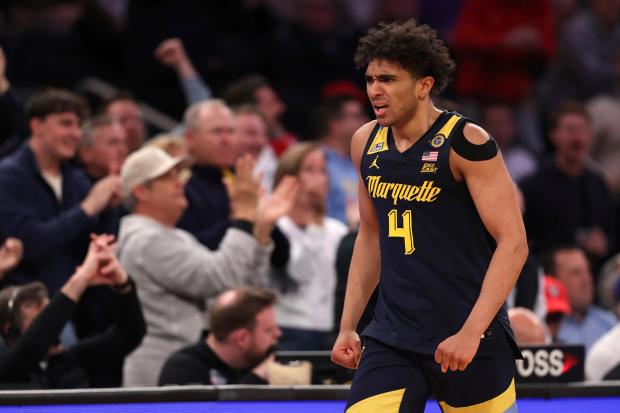 Marquette guard Stevie Mitchell reacts after scoring against Xavier in a Big East quarterfinal on March 13, 2025, in New York. (Pamela Smith/AP)