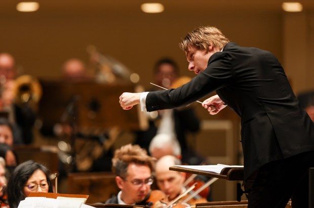 Klaus Mäkelä conducts the Chicago Symphony Orchestra in a performance of López Bellido's "Aino" at the Symphony Center on Feb. 16, 2022, in Chicago. His appointment as the CSO's new music director was announced in April 2024. (Shanna Madison/Chicago Tribune)