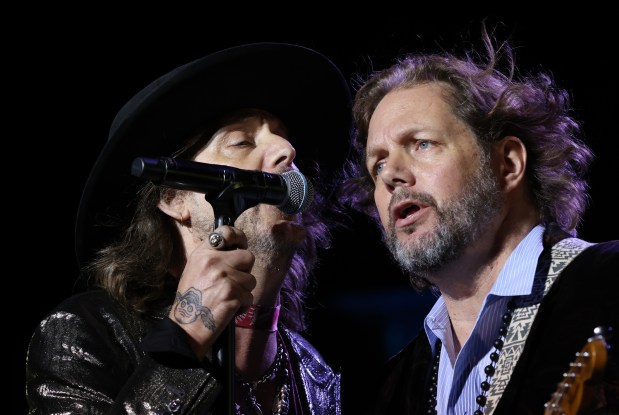 Chris Robinson, left, and Rich Robinson of the Black Crowes perform at Ravinia Festival on July 12, 2022, in Highland Park. (John J. Kim/Chicago Tribune)