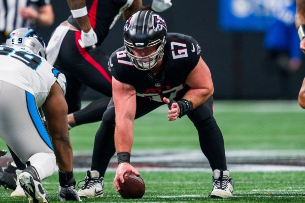 Falcons center Drew Dalman lines up during the first half against the Panthers on Jan. 5, 2025, in Atlanta. (AP Photo/Danny Karnik)