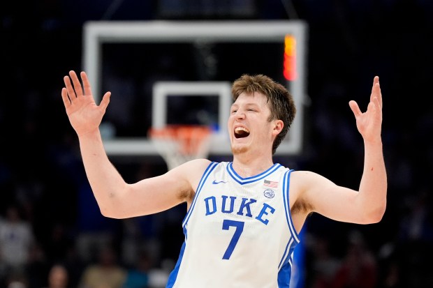 Duke guard Kon Knueppel reacts during the second half against Louisville on March 15, 2025, in Charlotte, N.C. (AP Photo/Chris Carlson)