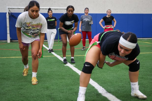 The Benedictine University women's flag football team practice at the Naperville Yard Indoor Sports Complex on Feb. 21, 2025. (Audrey Richardson/Chicago Tribune)