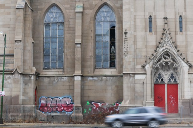 A car passes St. Martin's Church on March 4, 2025. (Eileen T. Meslar/Chicago Tribune)