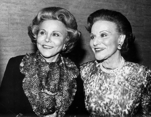 Advice columnist Ann Landers, left, and her twin sister, Abigail Van Buren, who wrote an advice column as Dear Abby, are shown in 1987, in Chicago. (John Bartley/Chicago Tribune)