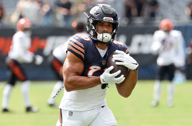 Chicago Bears running back Travis Homer warms up before a preseason game against the Cincinnati Bengals at Soldier Field on Aug. 17, 2024. (John J. Kim/Chicago Tribune)