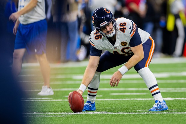 Bears long snapper Scott Daly warms up before a game against the Lions at Ford Field in Detroit on Nov. 28, 2024. (Tess Crowley/Chicago Tribune)