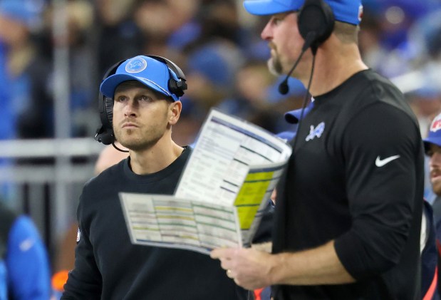 Lions offensive coordinator Ben Johnson, left, works alongside coach Dan Campbell during a game against the Bears on Nov. 28, 2024, at Ford Field in Detroit. (John J. Kim/Chicago Tribune)