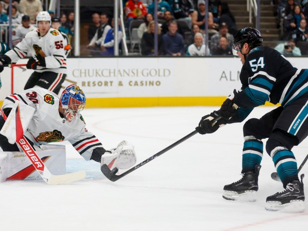 The Sharks' Patrick Giles takes a shot against Blackhawks goaltender Spencer Knight in the first period Thursday, March 13, 2025, in San Jose, Calif. (Shae Hammond/Bay Area News Group)