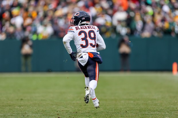 Bears cornerback Josh Blackwell returns a punt 94 yards for a touchdown during the first quarter against the Packers on Jan. 5, 2025, at Lambeau Field in Green Bay. (Armando L. Sanchez/Chicago Tribune)