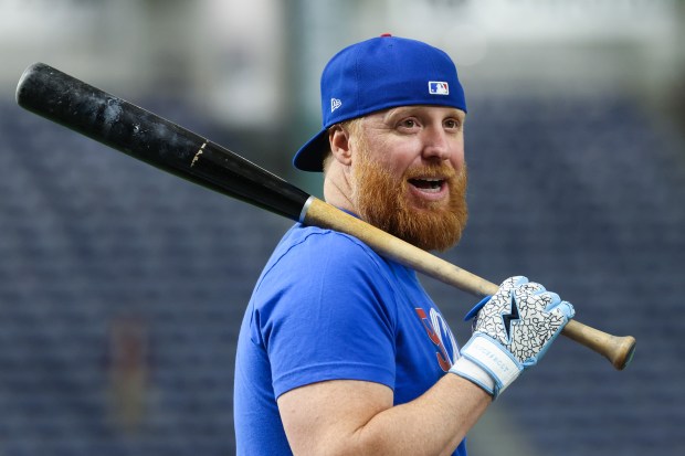 Cubs first baseman Justin Turner works out at the Tokyo Dome on March 17, 2025, in Tokyo. The Cubs play the Dodgers on March 18 in Tokyo to start the regular season. (John J. Kim/Chicago Tribune)