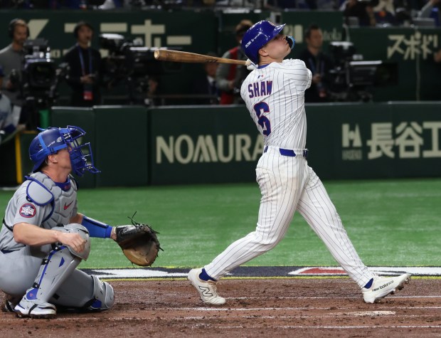 Cubs third baseman Matt Shaw swings for a strike in the second inning against the Dodgers at the Tokyo Dome on March 18, 2025, in Tokyo. (John J. Kim/Chicago Tribune)