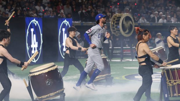 Cubs shortstop Dansby Swanson is introduced for a game against the Dodgers at the Tokyo Dome on March 19, 2025, in Tokyo. (John J. Kim/Chicago Tribune)