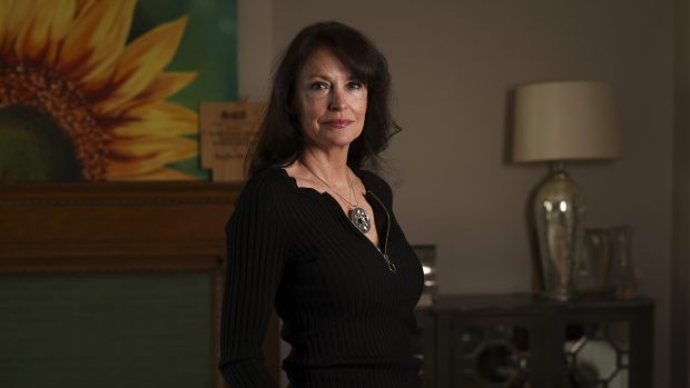 Filmmaker Maryilene Blondell at her home in the Lake View neighborhood on March 18, 2025. Blondell made the movie "Rise Above: The Carl Jackson Story," about a longtime caddie at Augusta National Golf Club. (Eileen T. Meslar/Chicago Tribune)