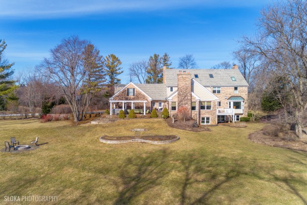 Barrington Hills 5-bedroom home with 5 fireplaces, stone patio: $1.3M (Sloka Photography and VHT Studios)