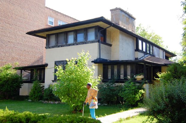 An undated photo of the J.J. Walser House with former owner Anne Teague standing in front of the home. (Eric Allix Rogers)