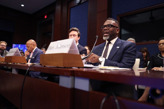 Chicago Mayor Brandon Johnson makes his opening statement alongside New York City Eric Adams, far left, and Denver Mayor Mike Johnston before the House Committee on Oversight and Government Reform on March 5, 2025, in Washington. (Brian Cassella/Chicago Tribune)