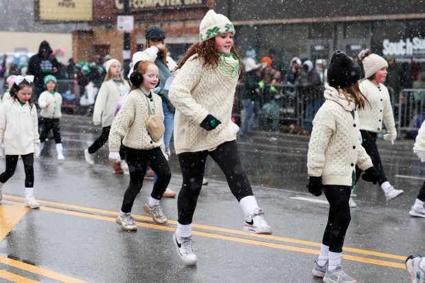 Irish dancers march south on Western Avenue in the South Side Irish Parade in Beverly and Morgan Park on March 16, 2025. Parade committee officials estimated a turnout of 77,000 at the event, which featured more than 100 entries and floats in its 45th year. (Eileen T. Meslar/Chicago Tribune)