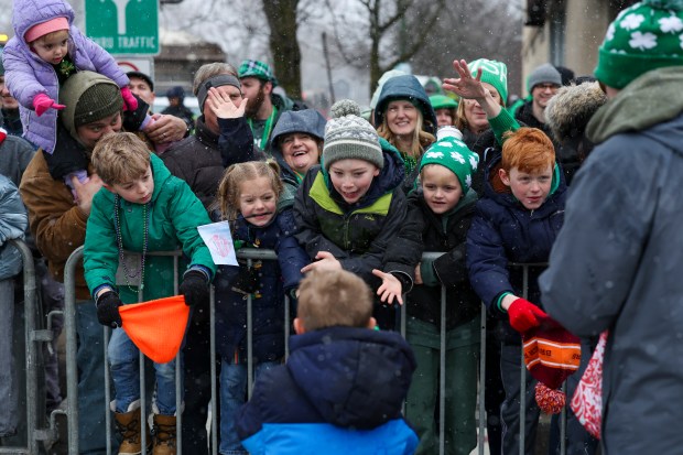 Children yell for candy during the South Side Irish Parade in Beverly and Morgan Park. (Eileen T. Meslar/Chicago Tribune)