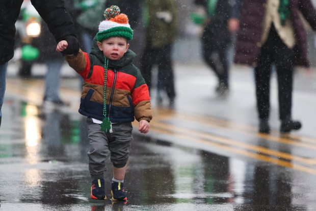 Arthur Pauls, 2, marches on Western Avenue in the South Side Irish Parade in Beverly and Morgan Park. (Eileen T. Meslar/Chicago Tribune)