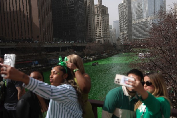 The Chicago River is dyed green by the Chicago Journeymen Plumbers Local 130, to celebrate St. Patrick's Day, March 15, 2025. in Chicago. (Audrey Richardson/Chicago Tribune)