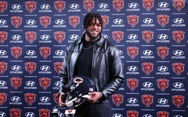 New Bears defensive end Dayo Odeyingbo poses as he is introduced at Halas Hall on March 13, 2025, in Lake Forest. (Chris Sweda/Chicago Tribune).