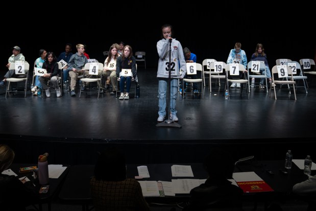 Ruth Aguilar, of Logan Square Elementary, competes with other Chicago Public Schools students in the 2025 Citywide Spelling Bee Championship at Curie Metropolitan High School on March 13, 2025. (Audrey Richardson/Chicago Tribune)